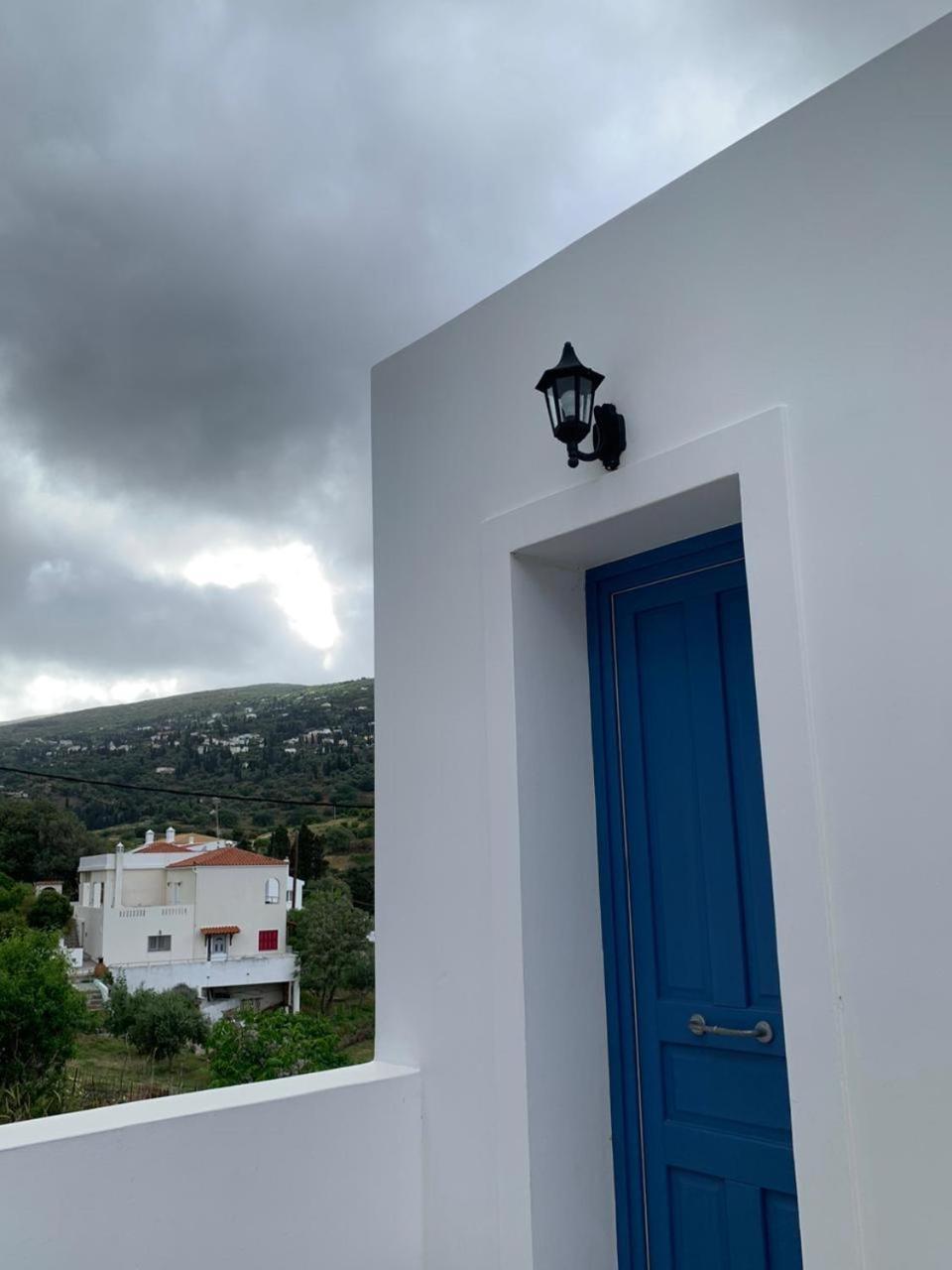 Andros Guesthouses Chambre photo
