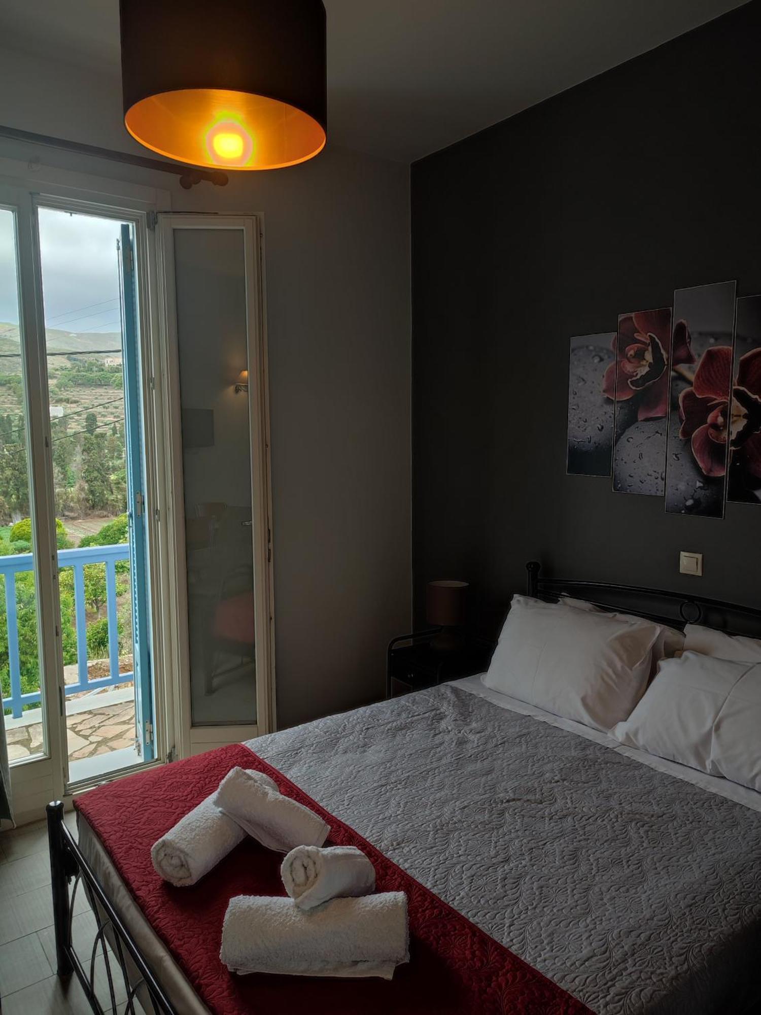 Andros Guesthouses Extérieur photo