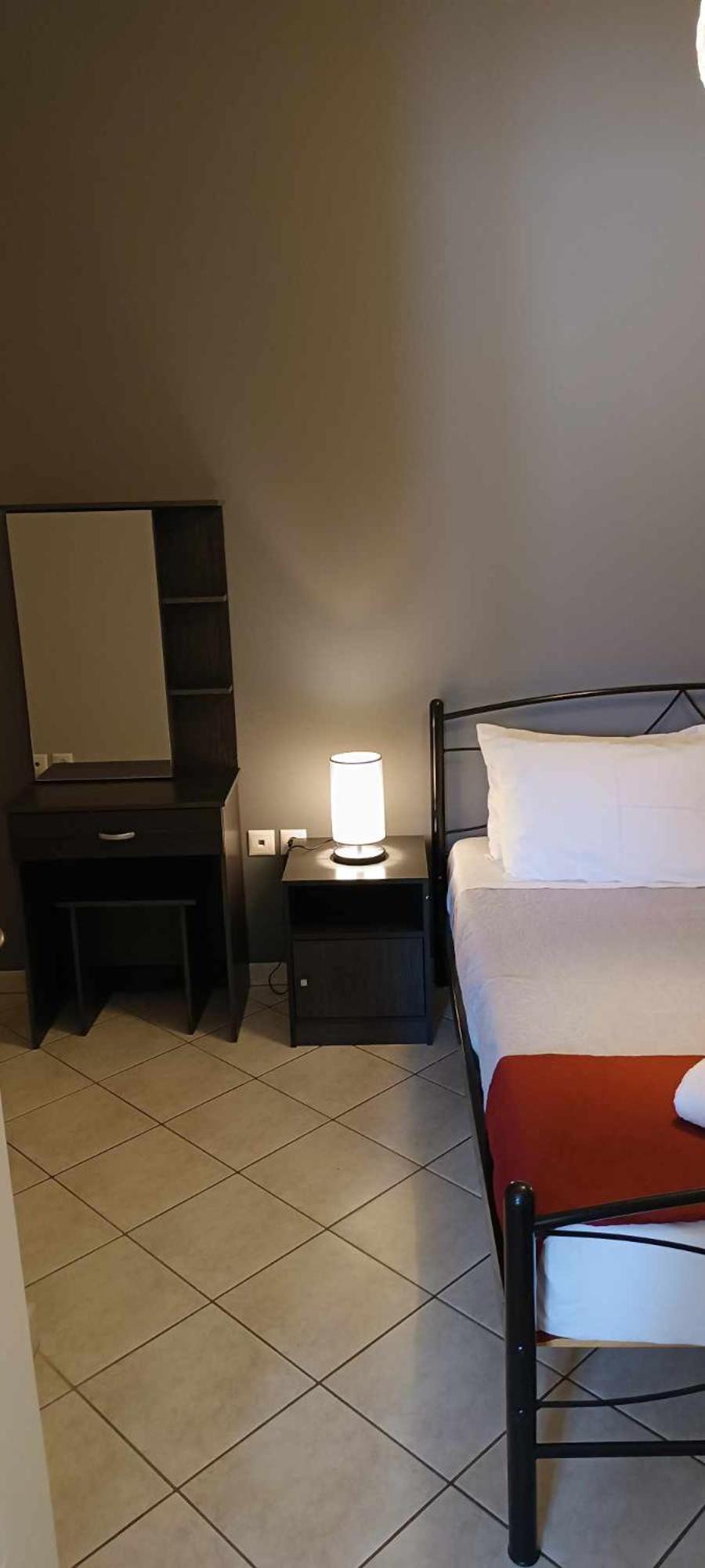 Andros Guesthouses Chambre photo