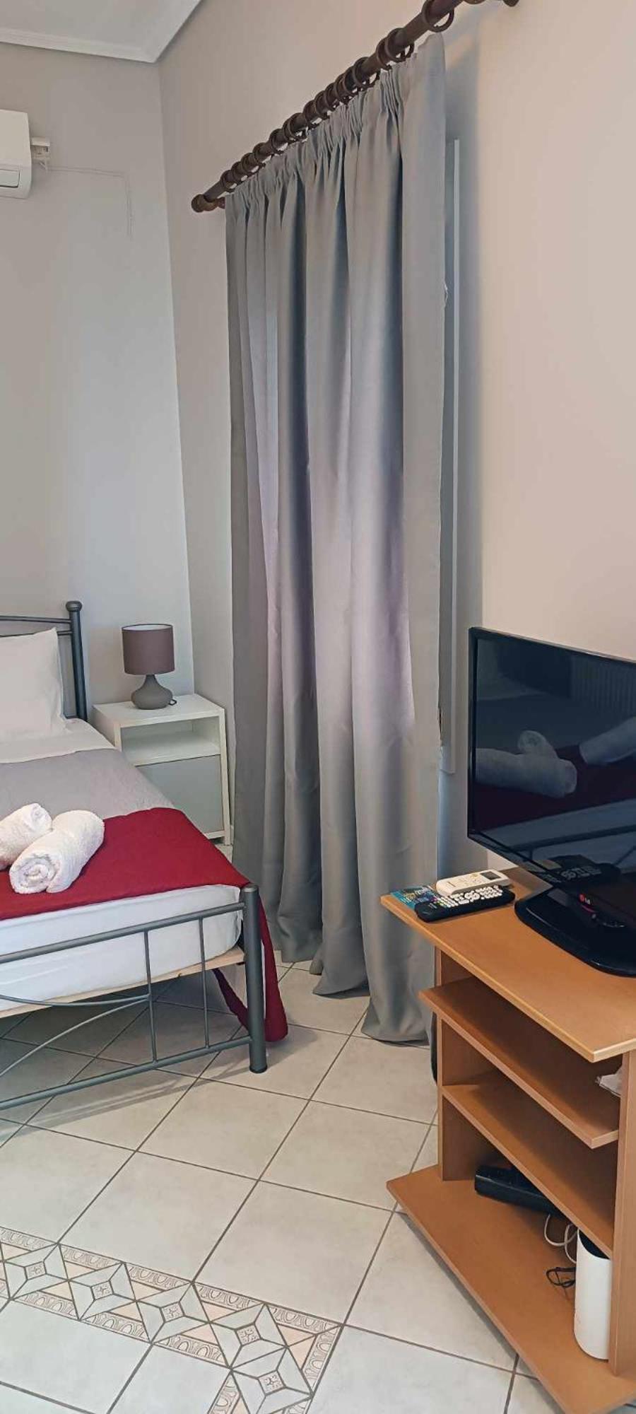 Andros Guesthouses Chambre photo