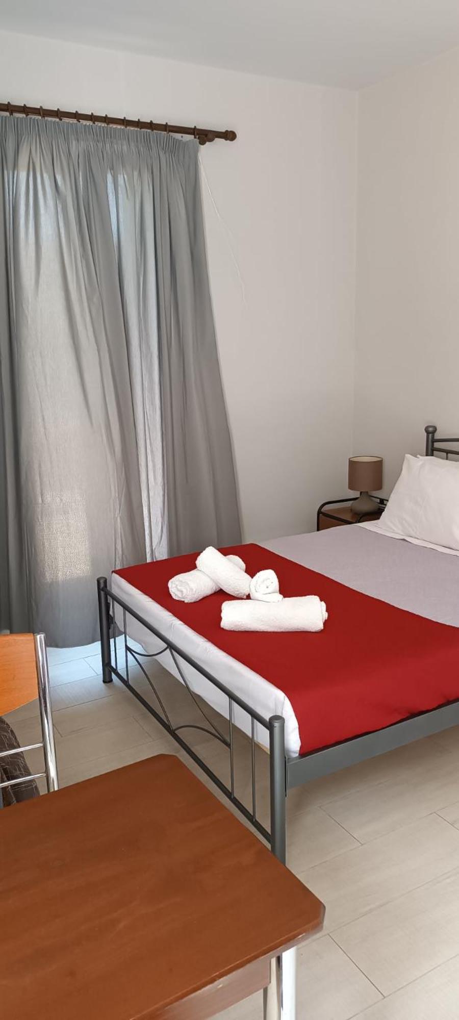 Andros Guesthouses Chambre photo