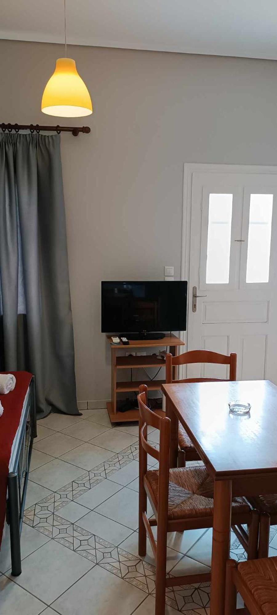 Andros Guesthouses Chambre photo