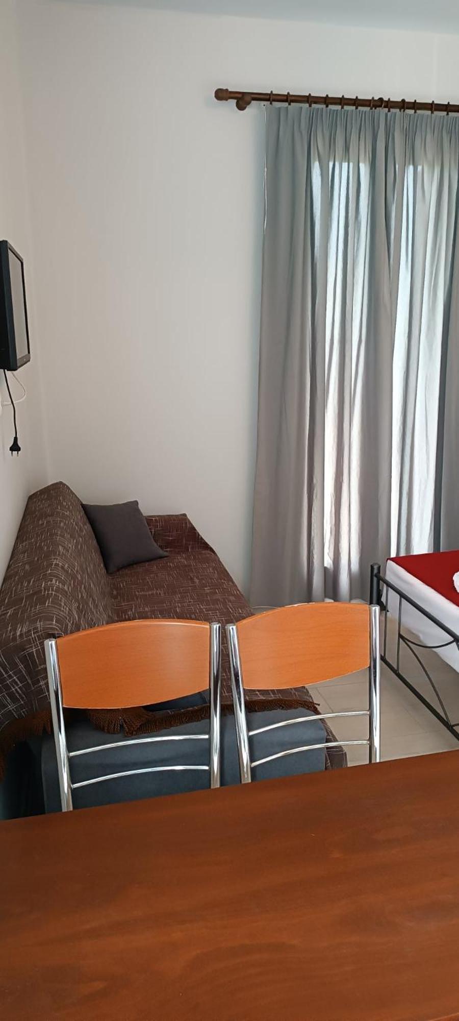 Andros Guesthouses Chambre photo